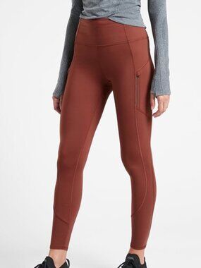 Athleta Rainier High-Waisted Tights Leggings with Pockets — Rust Orange / Medium
